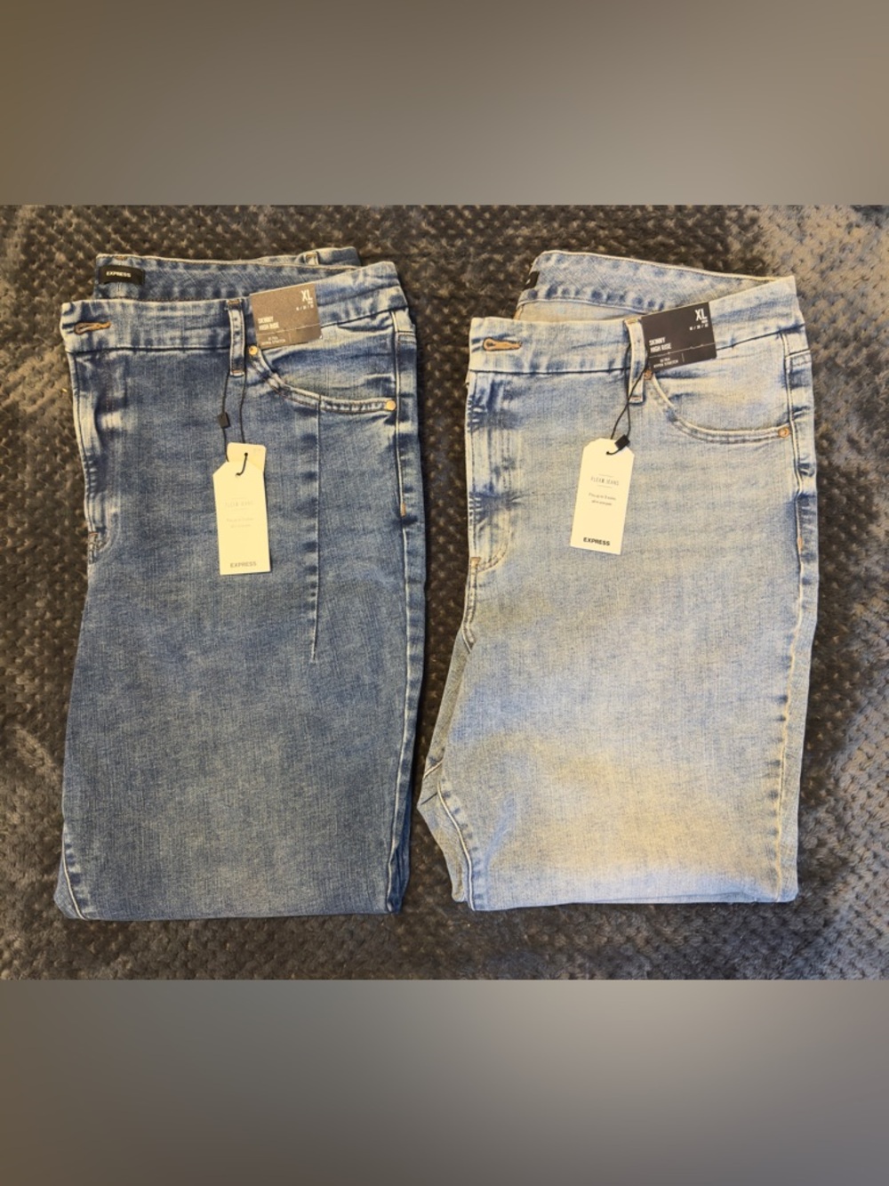 2 Pairs of Express Flexx Jeans. XL Reg 18, 20, 22. Light blue and Medium blue.